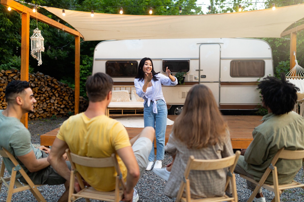a-group-of-friends-playing-charades-outdoors