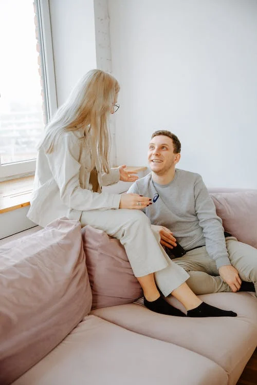 A man and a woman talking comfortably with each other