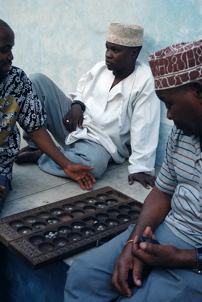 Men Playing Mancala