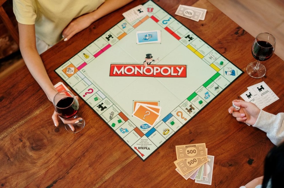 two persons playing monopoly