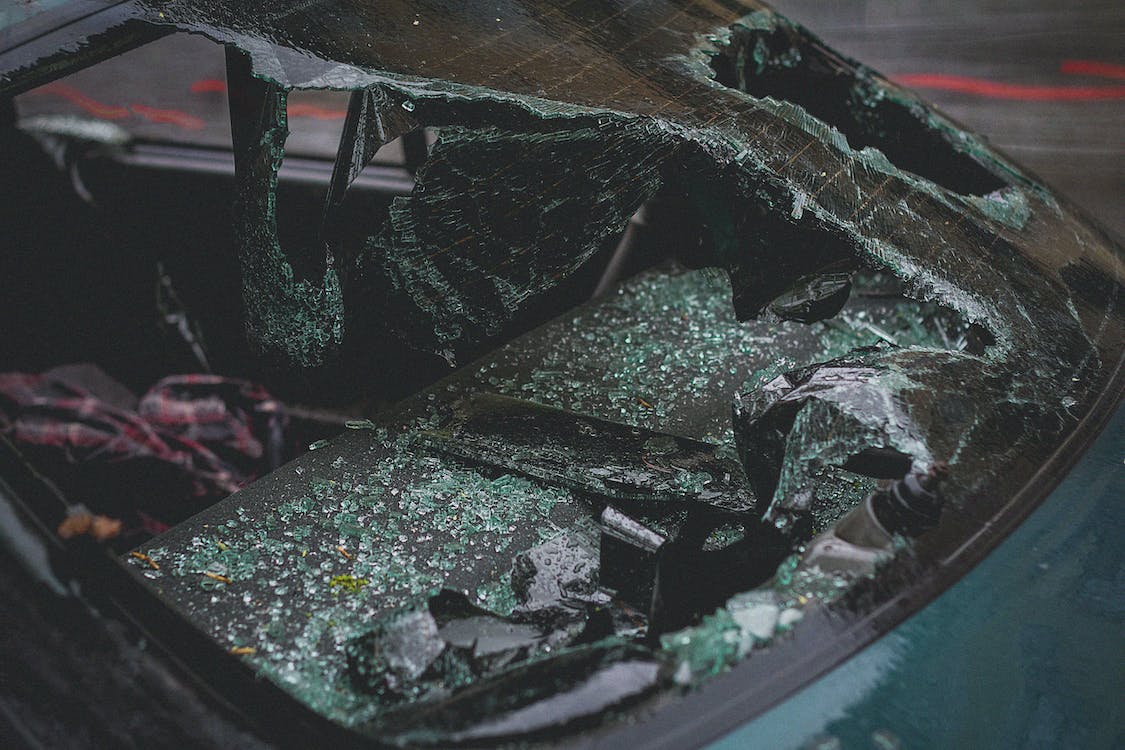  a close up of a car’s broken windshield