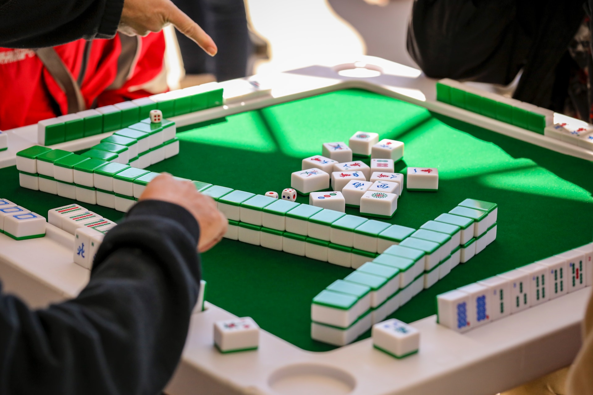 A close up of a game of dominos on a table