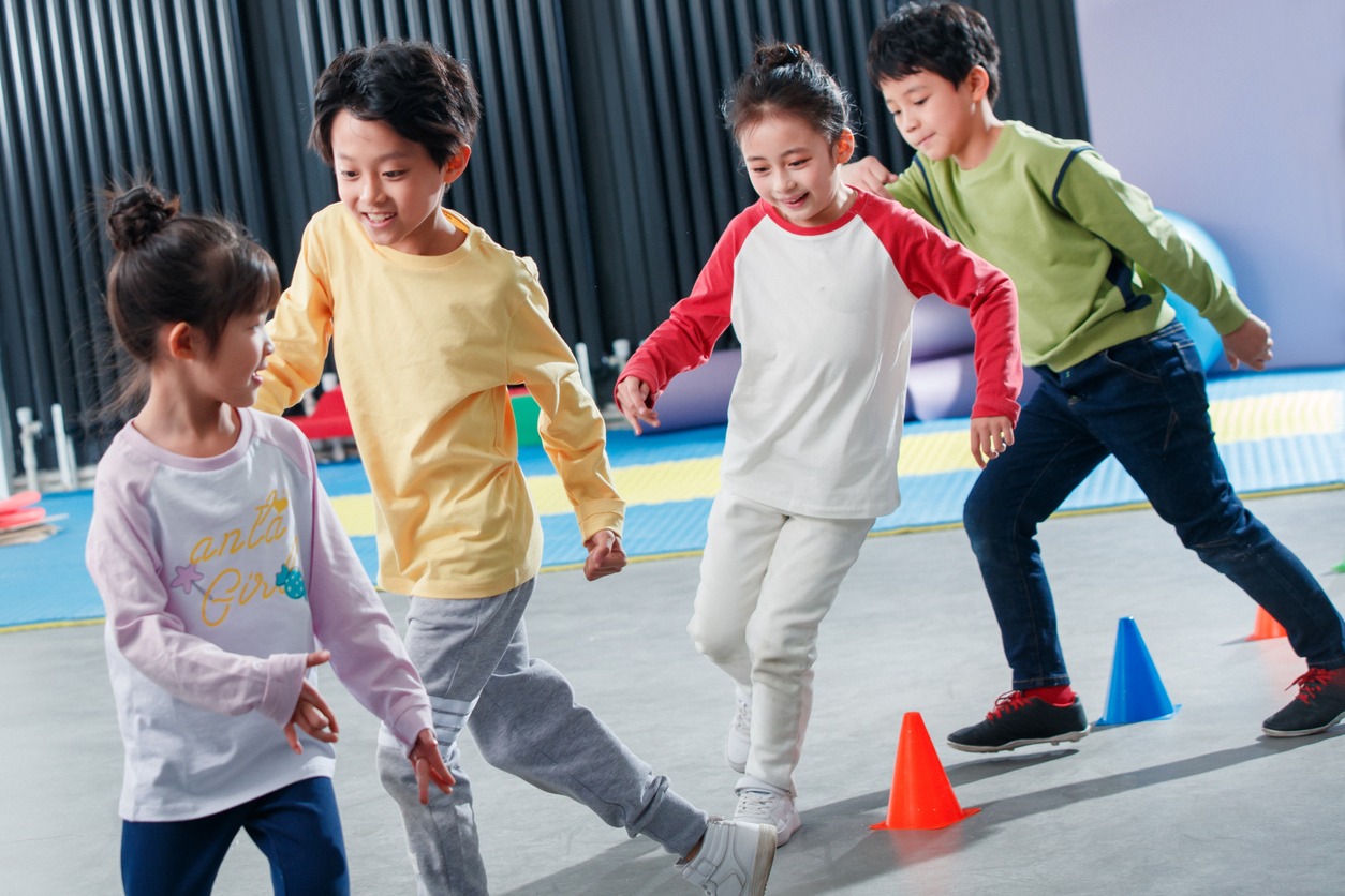 children playing obstacle course on the floor